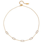 Gold chain necklace on a white background