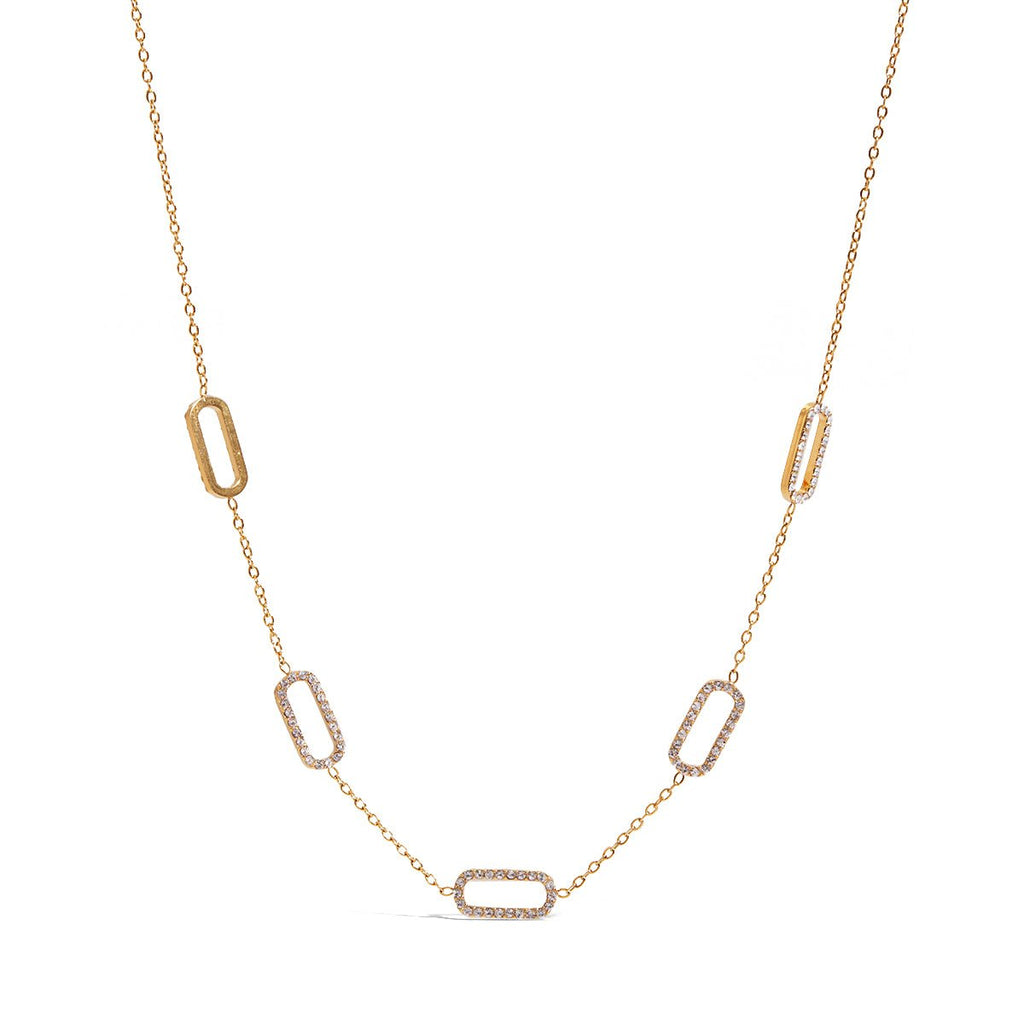 Gold necklace with geometric links on a white background
