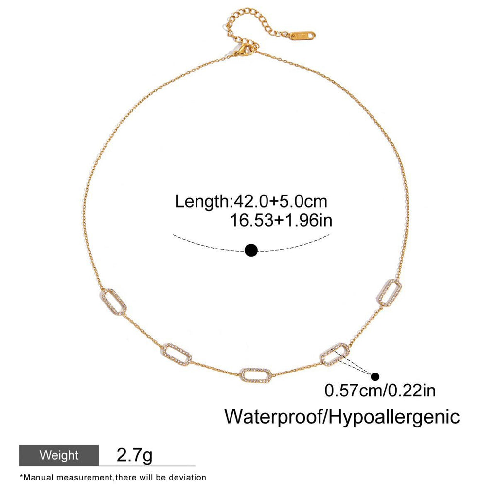 Gold necklace with measurement details on a white background