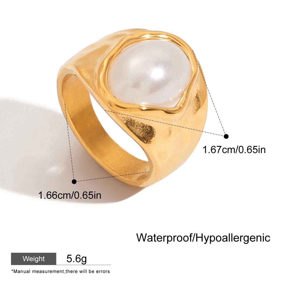 Gold ring with a pearl-like stone on a white background