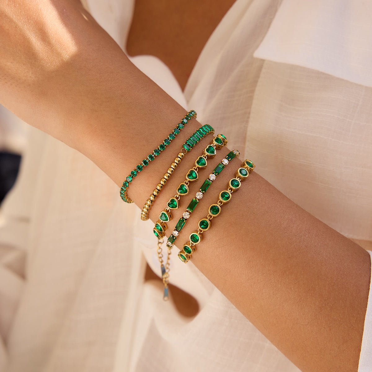 Emerald green tennis bracelet with gold finish