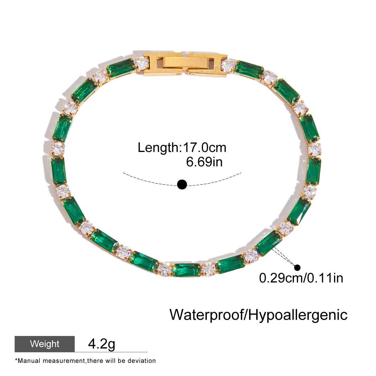 Gold tennis bracelet with baguette emeralds and round white gems

