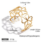 Elegant openwork flower bracelet in gold tone