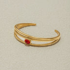 18K gold-filled bracelet with oval garnet centerpiece