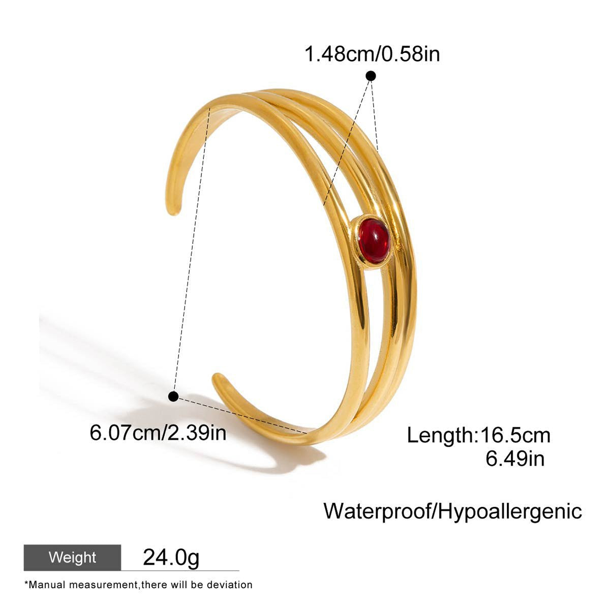 Artistic flat lay of gold garnet cuff bracelet