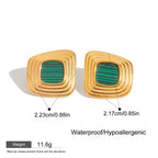 Gold and green earrings with measurements and product details on a white background