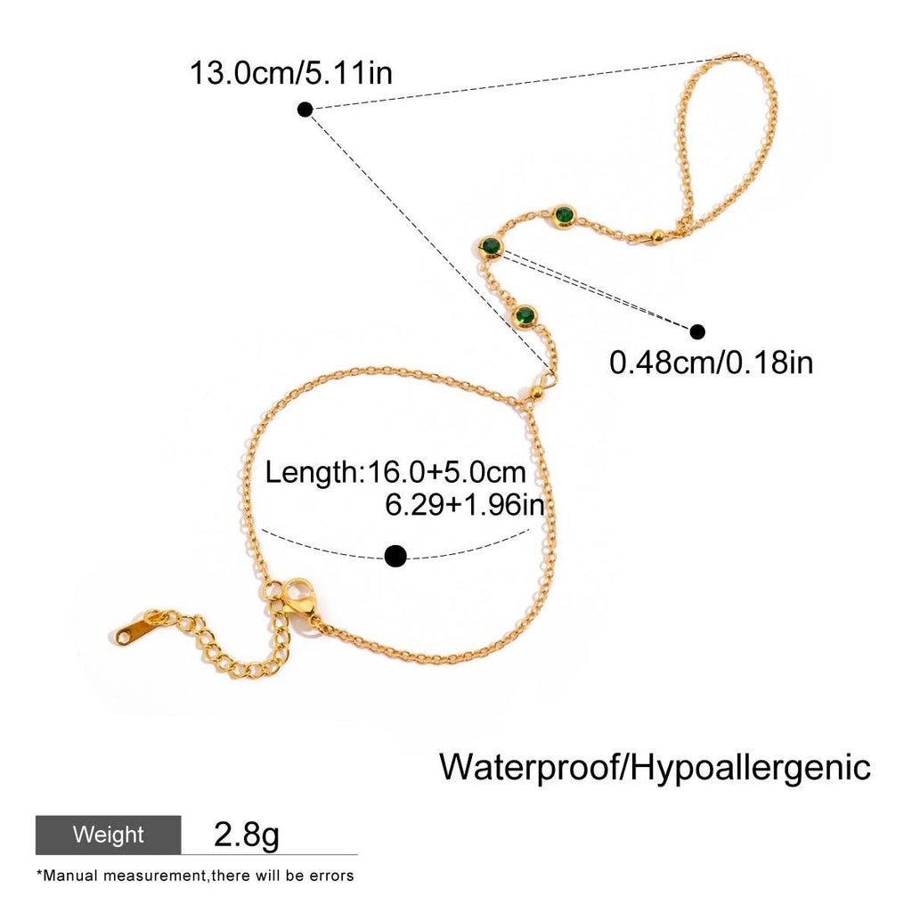 Gold bracelet with measurements and product details on a white background