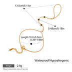 Gold bracelet with measurements and product details on a white background