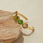 Luxurious gold bracelet with six oval gems