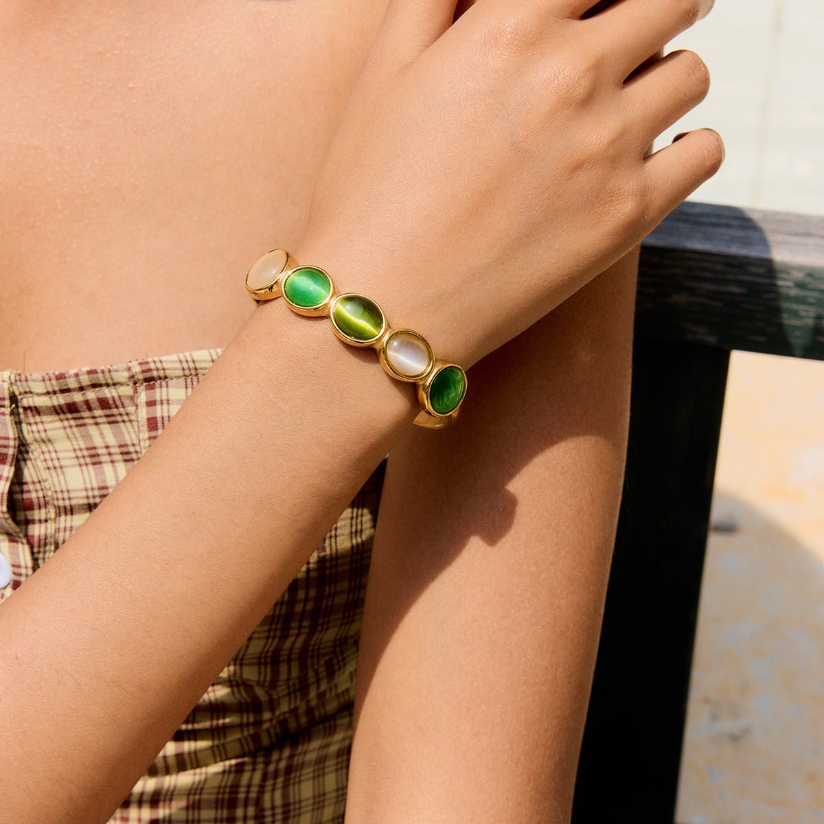 Modern and elegant oval gemstone cuff bracelet