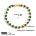 18k gold-filled heart emerald bracelet flat lay