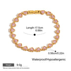 Gold bracelet with pink heart gemstones