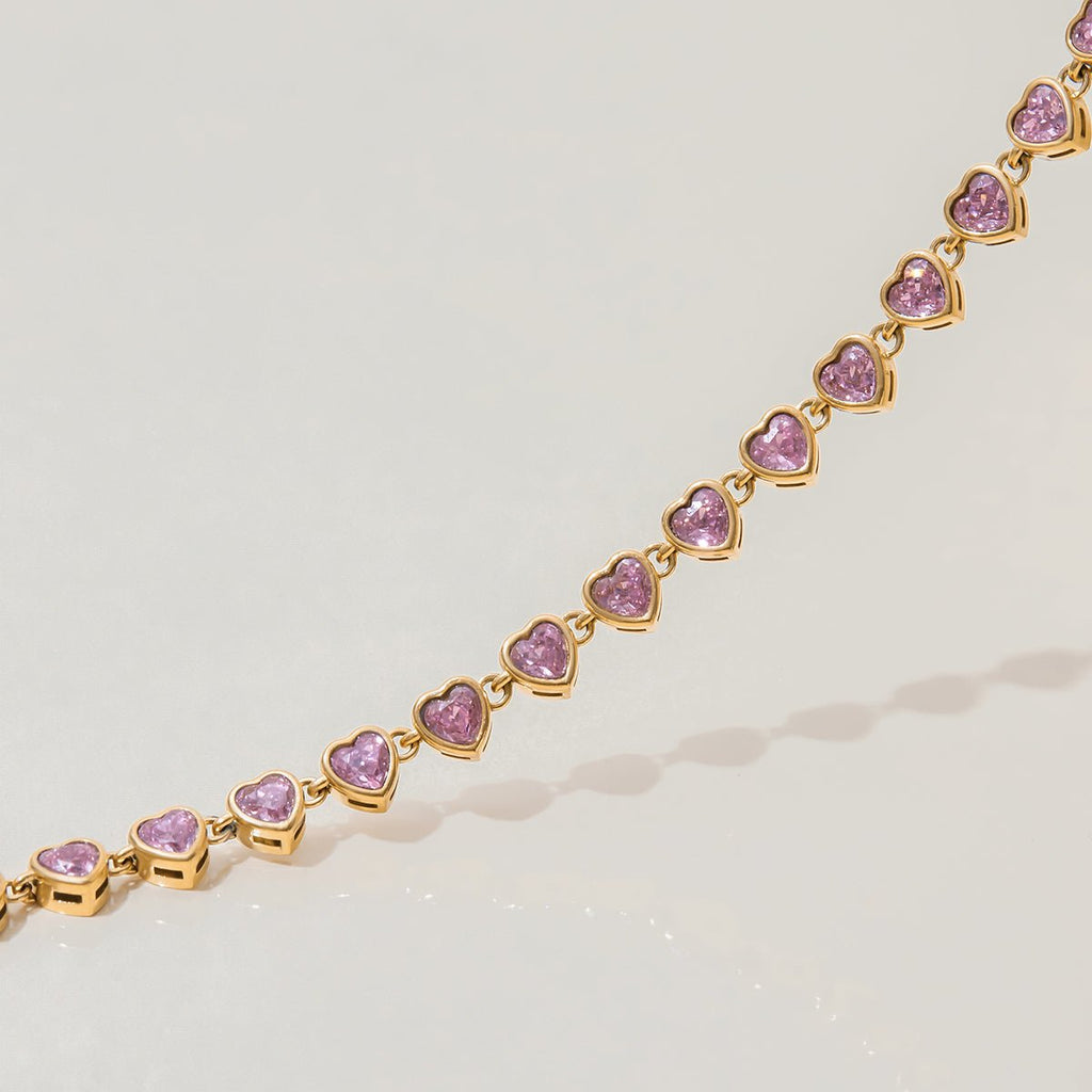 Bezel-set pink heart gemstone bracelet in gold