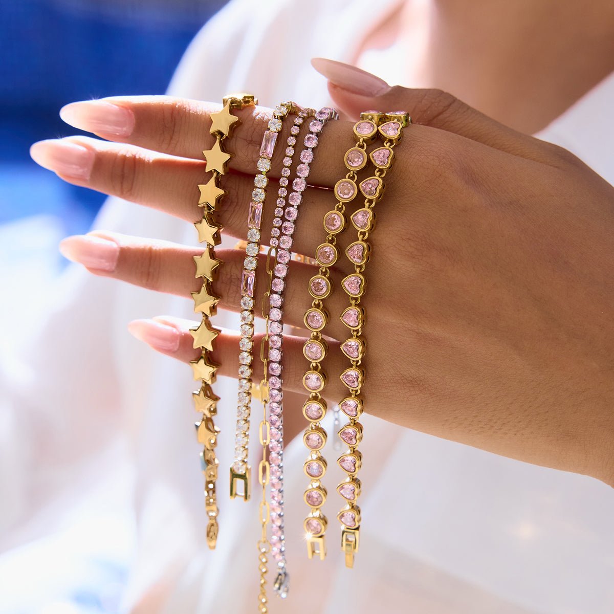 Women’s silver bracelet with sparkling pink accents