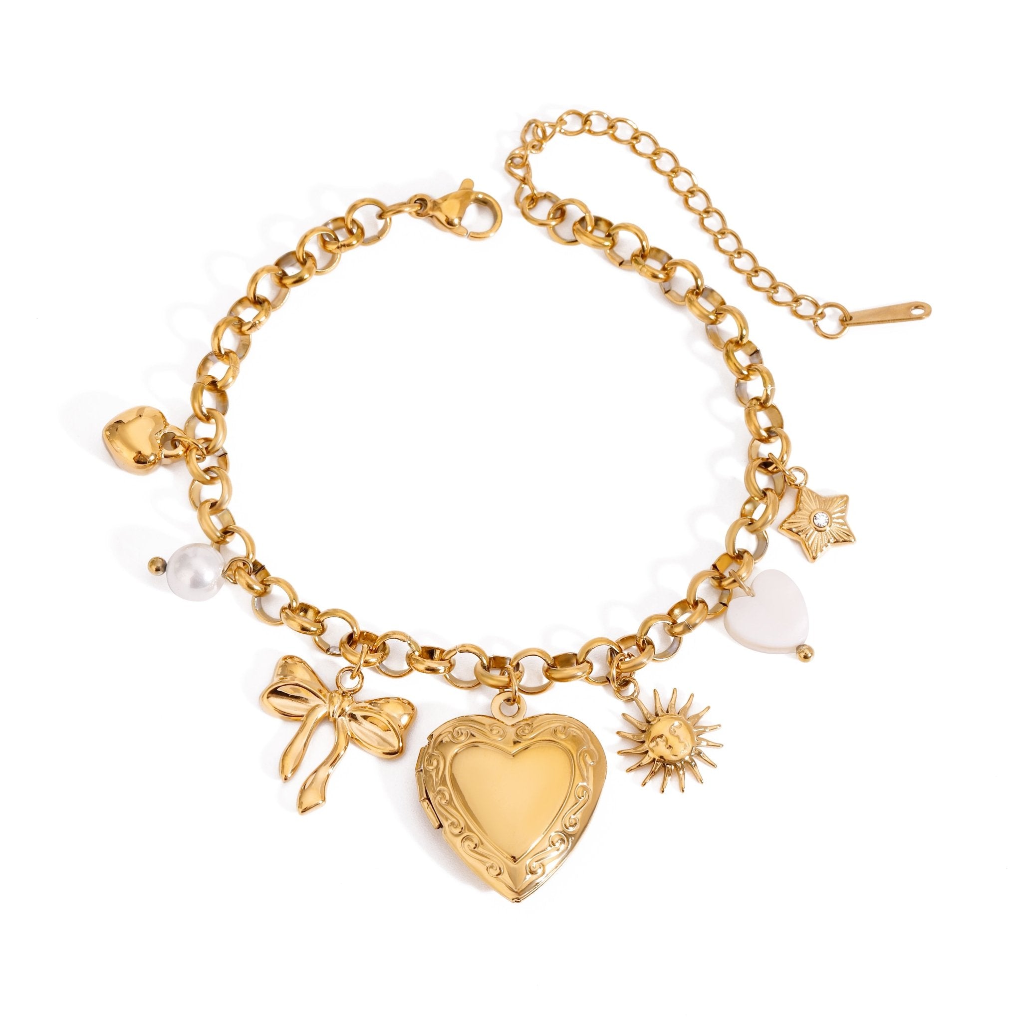 Gold bracelet with various charms on a white background
