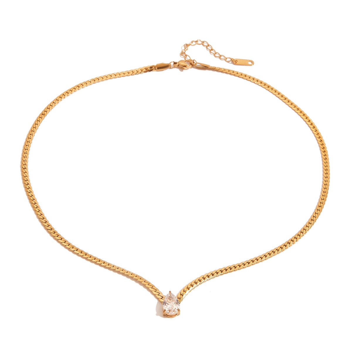 Gold chain necklace with a small pendant on a white background