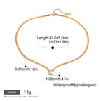 Gold necklace with measurements and product details on a white background