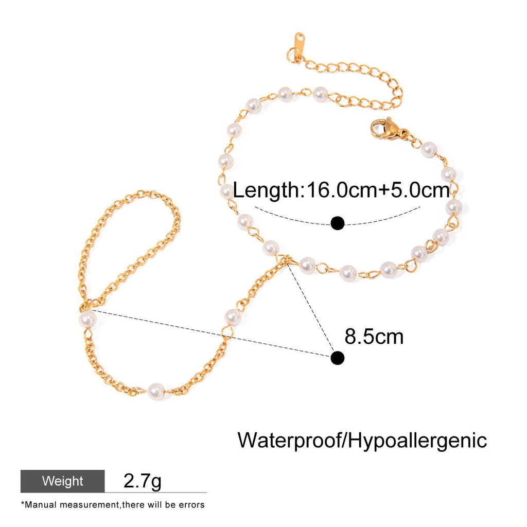 Gold and pearl necklace with measurements and product details on a white background