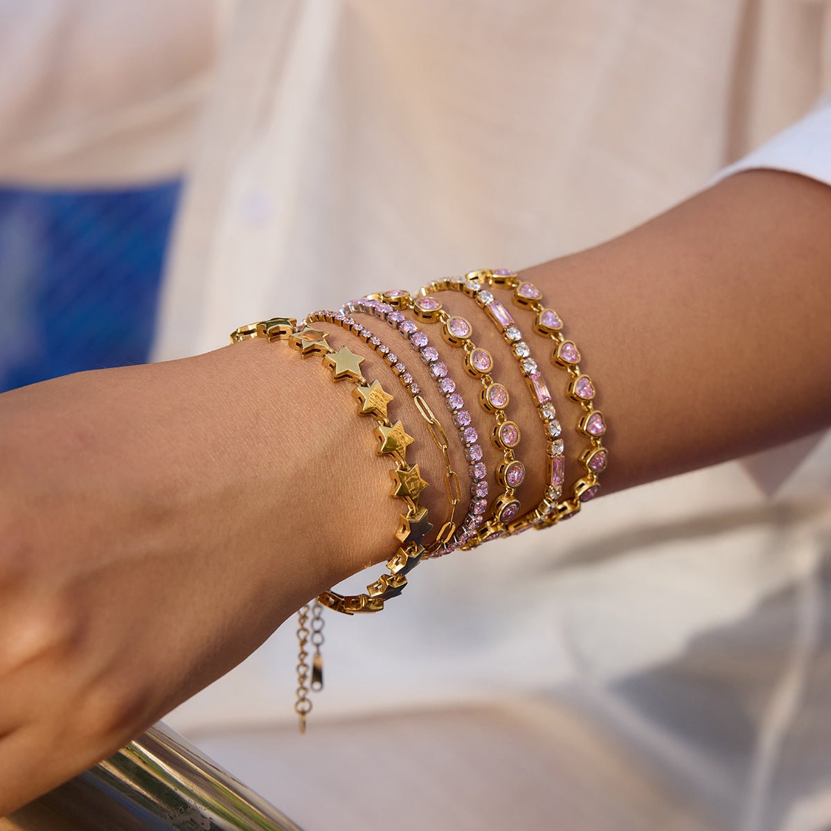 Elegant rhodium bracelet with pink crystal gems