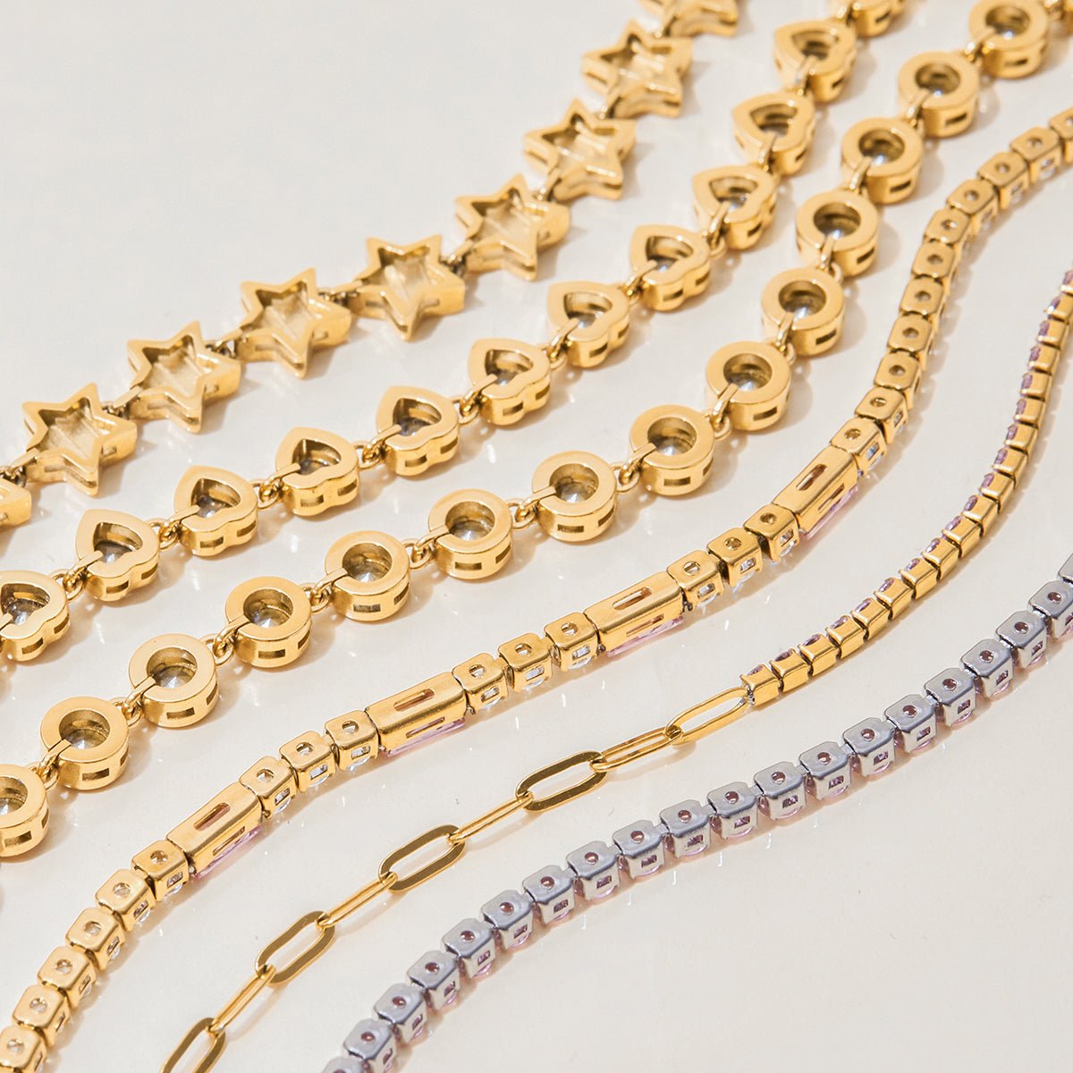 Romantic pink heart tennis bracelet flat lay