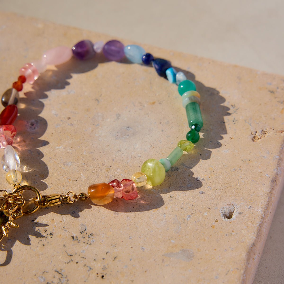 Artistic photo of multicolored gemstone bracelet

