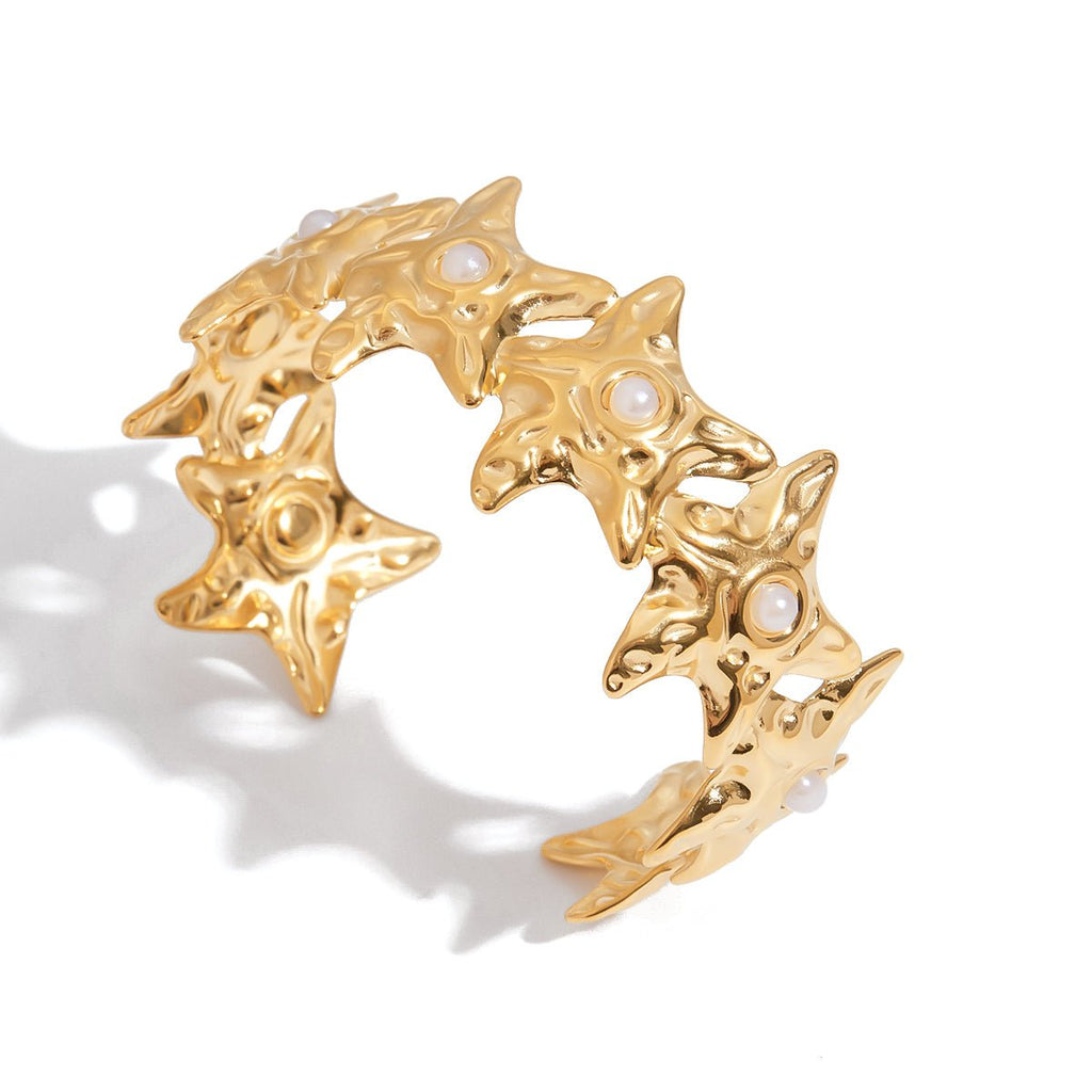 California Collection gold bracelet featuring abstract stars