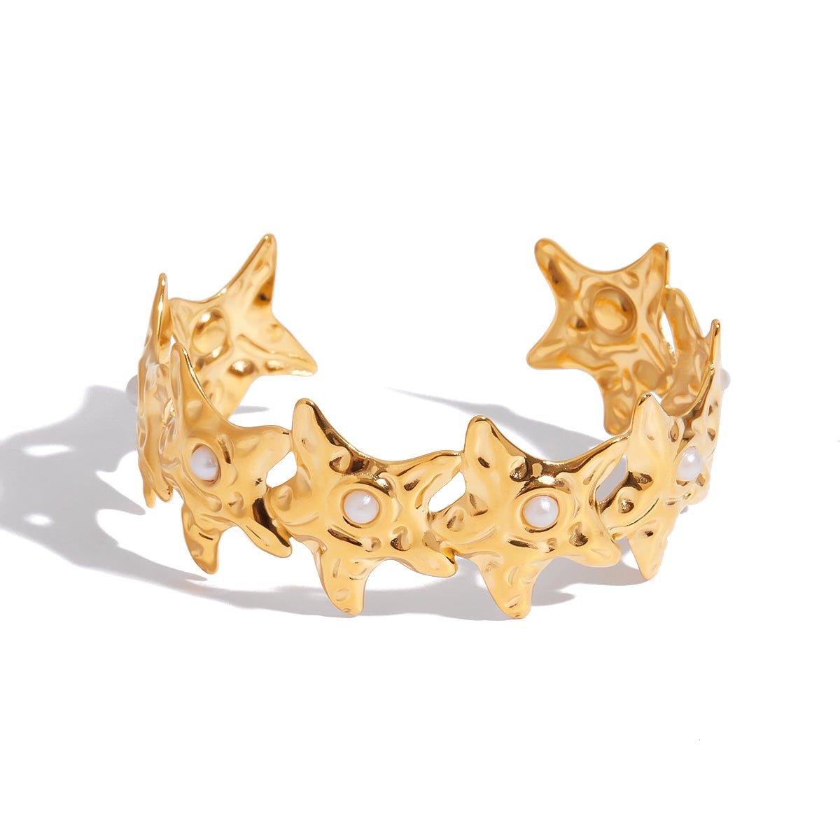 18K gold-filled star cuff bracelet with pearls on white background