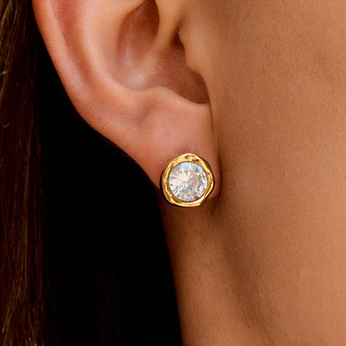 Elegant gold stud earrings with large cubic zirconia

