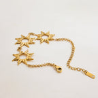 Open circle sun motif bracelet in polished gold

