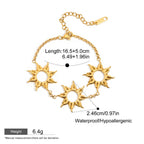 Adjustable gold bracelet with three sun designs

