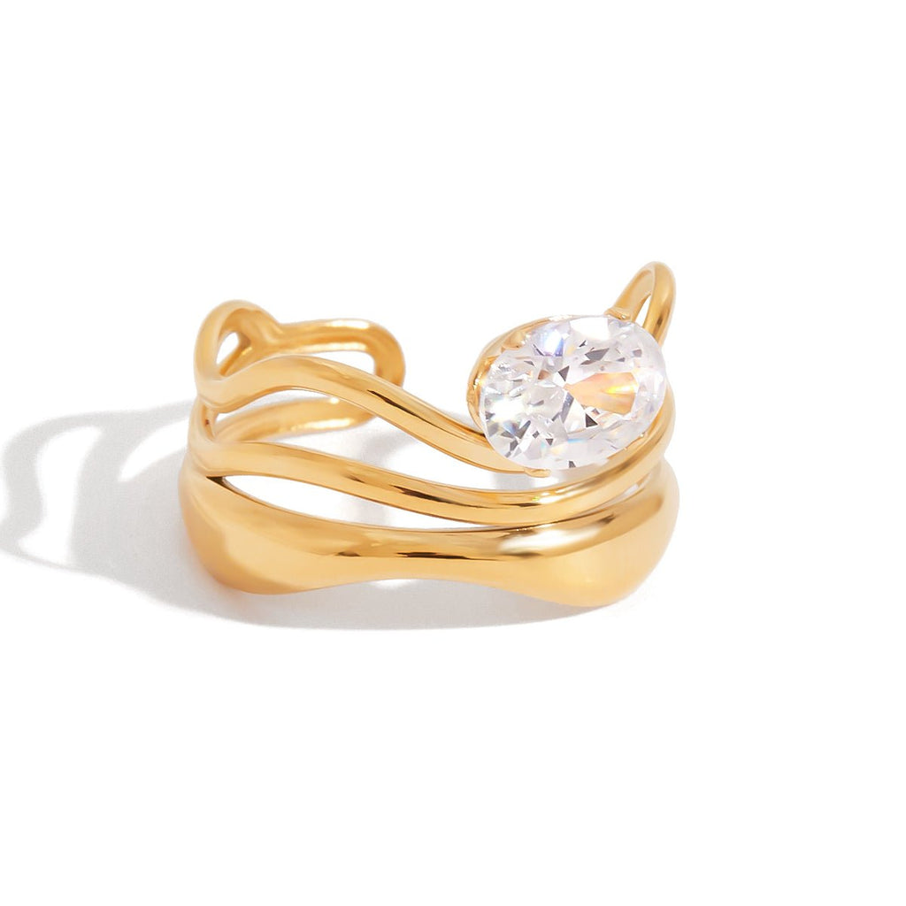 Gold ring with a diamond on a white background