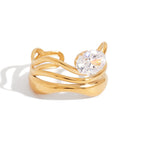 Gold ring with a diamond on a white background