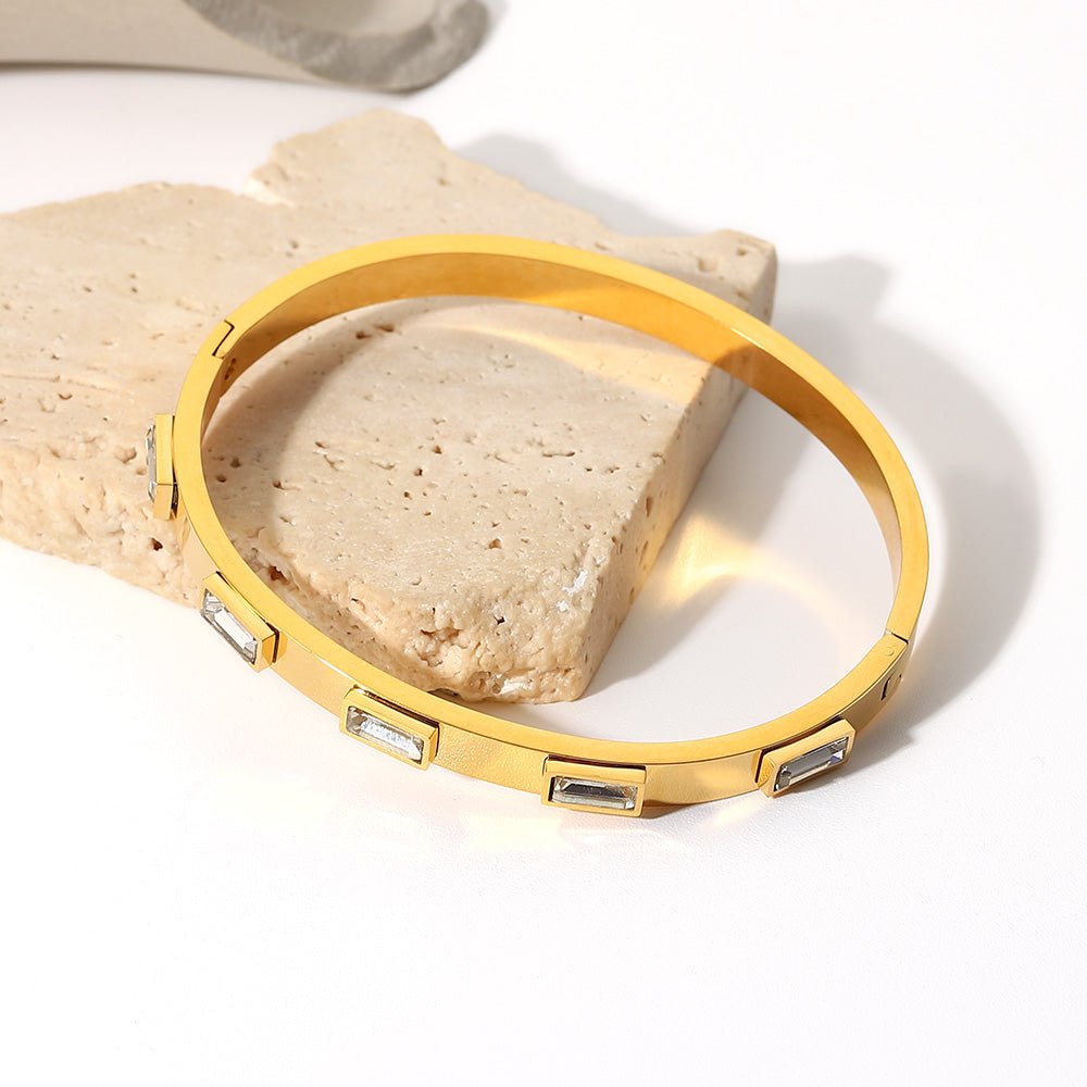 California Collection gold bangle with white gems

