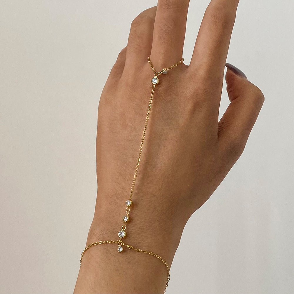 Dainty wrist-to-finger chain bracelet in gold