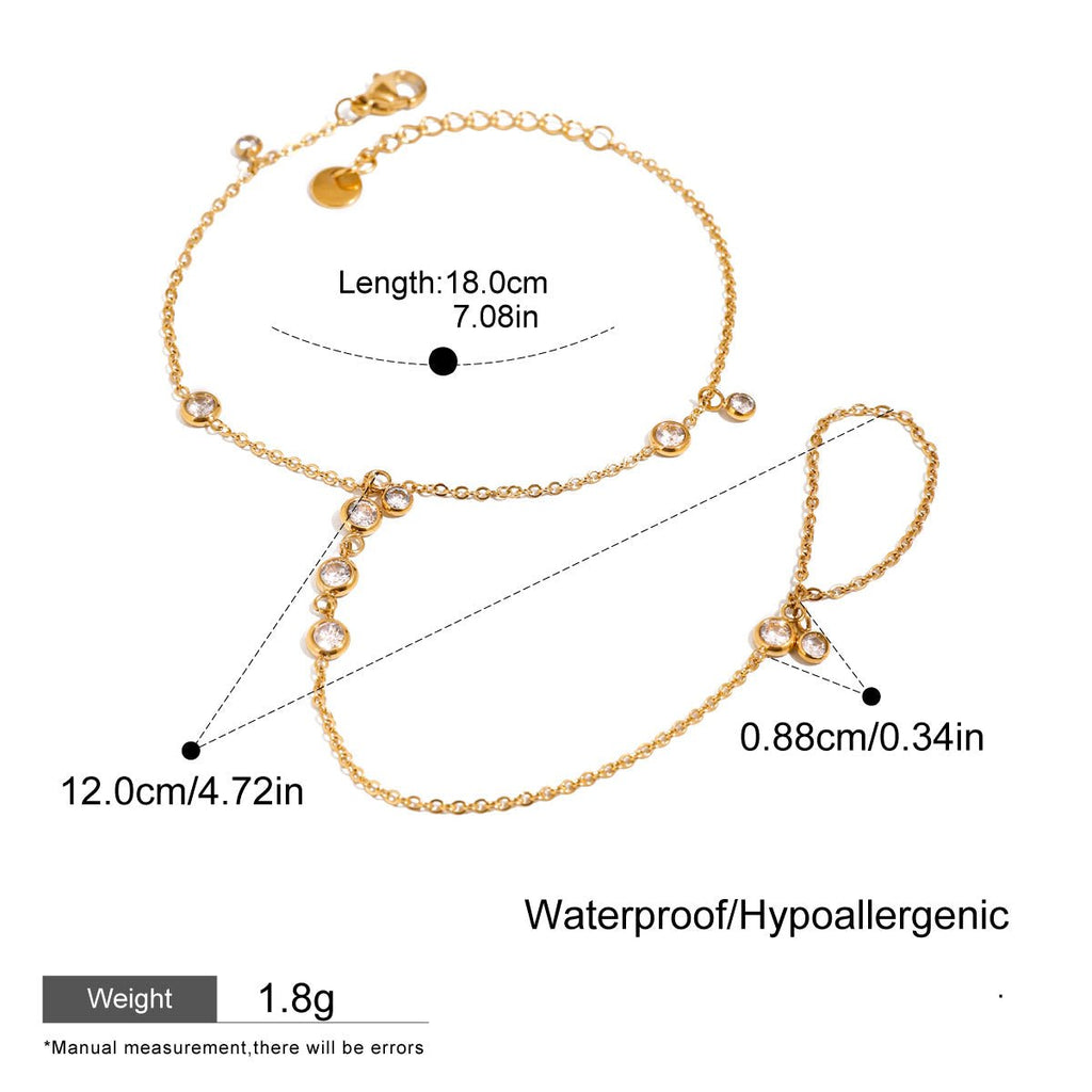 Gold bracelet with measurements and product details on a white background