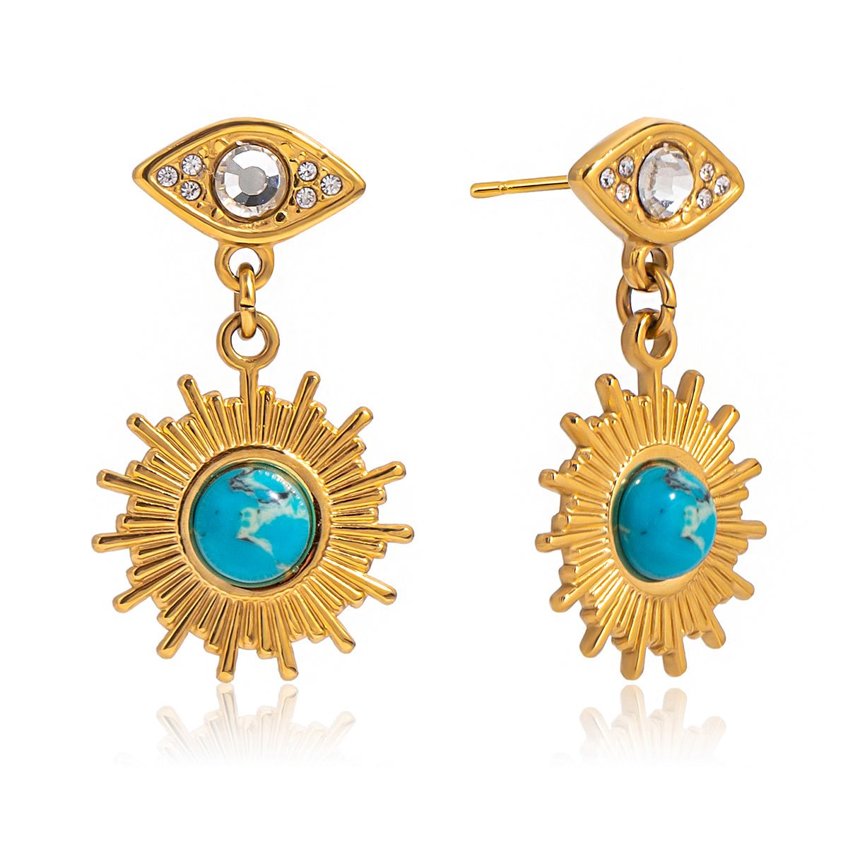 Gold earrings with turquoise stones on a white background
