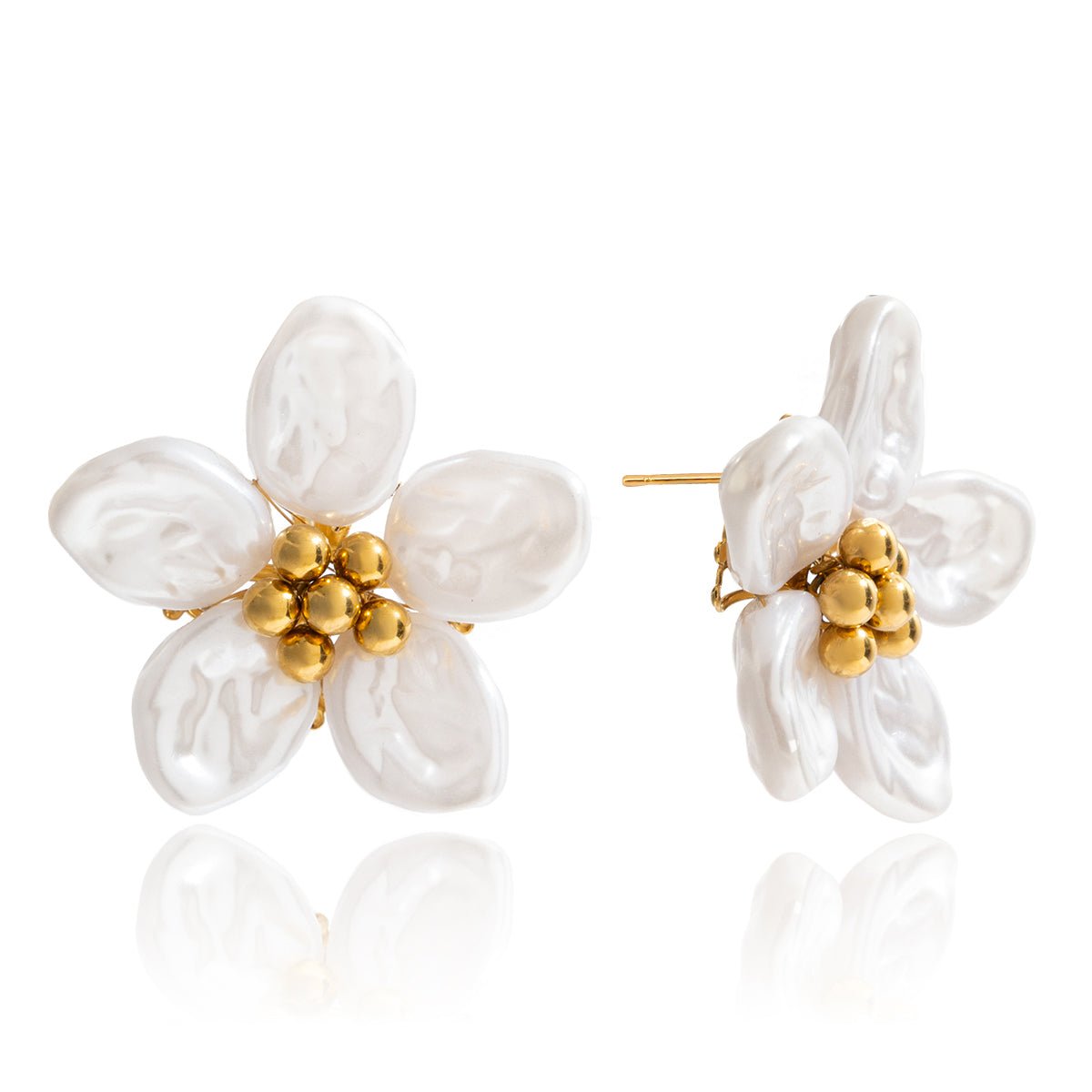 Floral earrings with white petals and gold centers on a white background