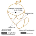 Gold chain bracelet with measurements and product details on a white background