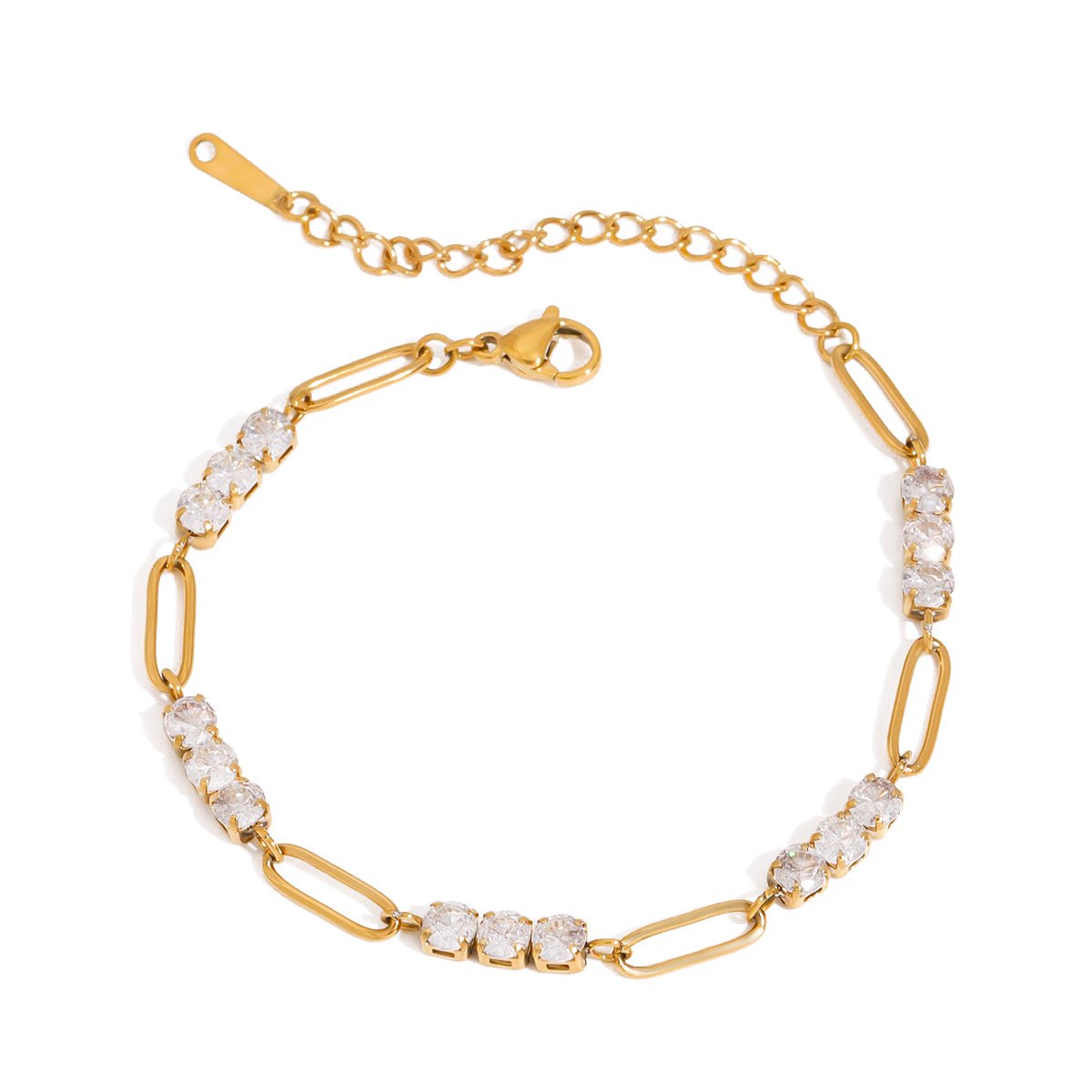 Gold bracelet with clear gemstones on a white background