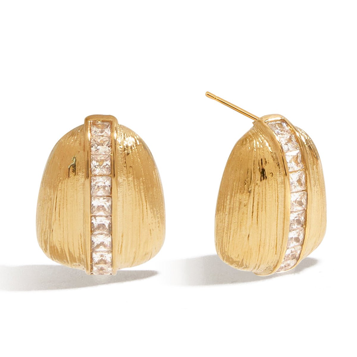 Gold earrings with diamond accents on a white background