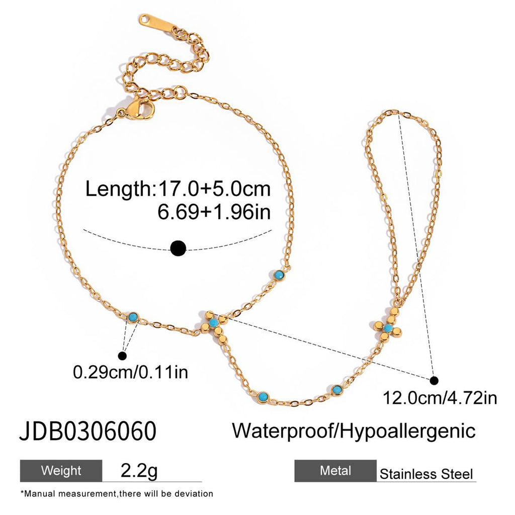 Gold bracelet with measurements and product details on a white background