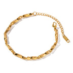 Gold chain bracelet on a white background