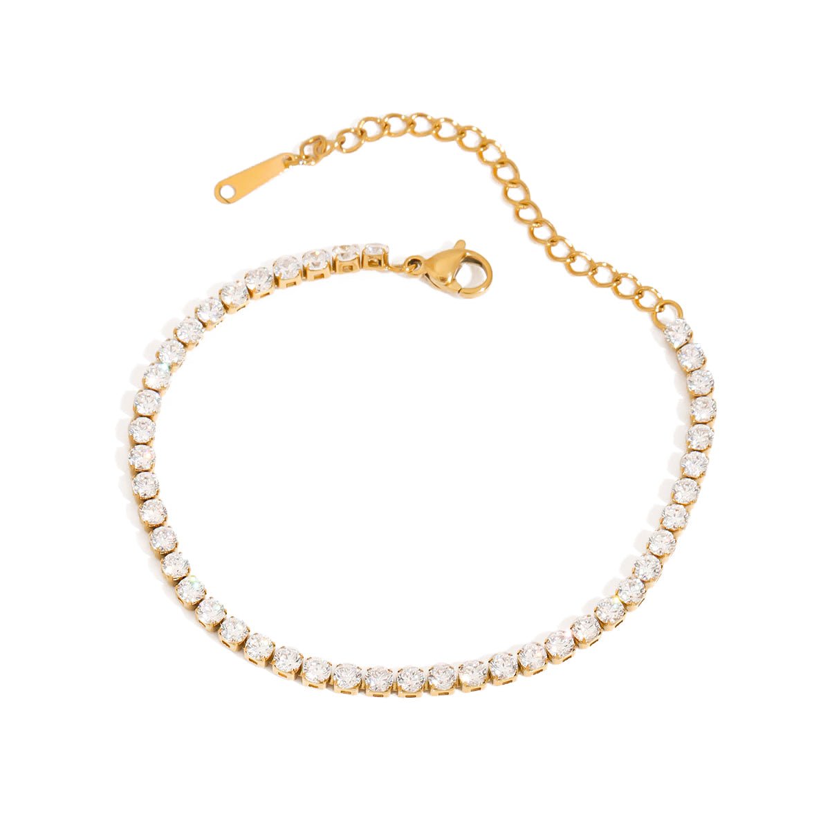 Gold bracelet with clear stones on a white background