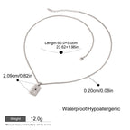 Silver necklace with measurement details on a white background