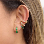 Waterproof The Windsor Emerald earrings with rectangular emerald green crystals.