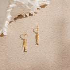 Tarnish-free ocean-proof Very Fishy Indeed earrings safe for beach wear.