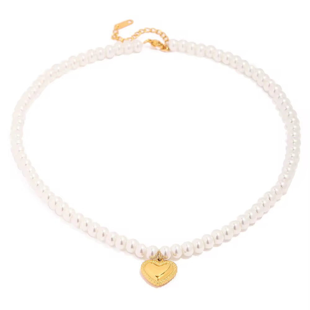 Technical drawing of The Pearl Strand showing 40cm length and 1.46cm heart pendant.