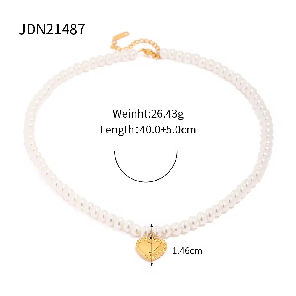 Sweat-proof gold and pearl jewelry for active lifestyles and gym wear.