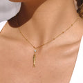 Very Fishy Indeed necklace with 18k gold PVD plated fish pendant and bead chain.
