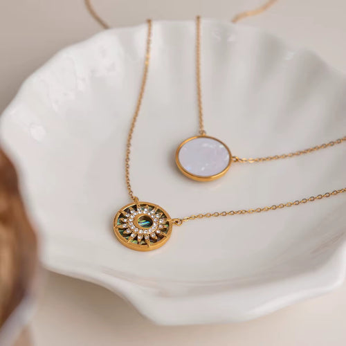 North Star celestial pendant necklace in 18k gold PVD plated stainless steel.